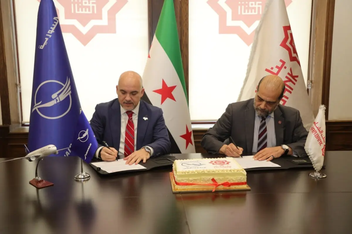 Cham Bank, represented by its CEO Mr. Ahmad Al-Laham, signed a cooperation agreement with the Syrian Aviation Holding Company, represented by Captain Anwar Bassam Akkad